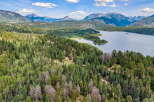 Discover this stunning property offering breathtaking mountain and lake views.