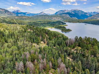 Discover this stunning property offering breathtaking mountain and lake views.