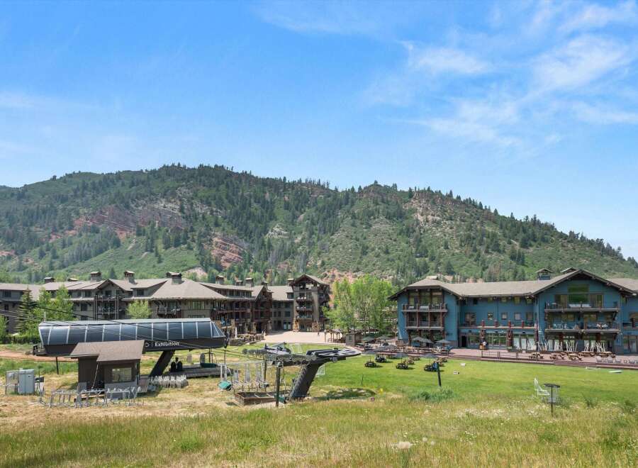 Experience the ultimate mountain getaway at this stunning resort, featuring luxurious accommodations and breathtaking views of the surrounding peaks.