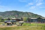 Experience the ultimate mountain getaway at this stunning resort, featuring luxurious accommodations and breathtaking views of the surrounding peaks.