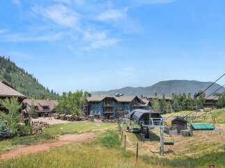 Experience mountain living at its finest with this stunning property featuring a ski lift and picturesque views.