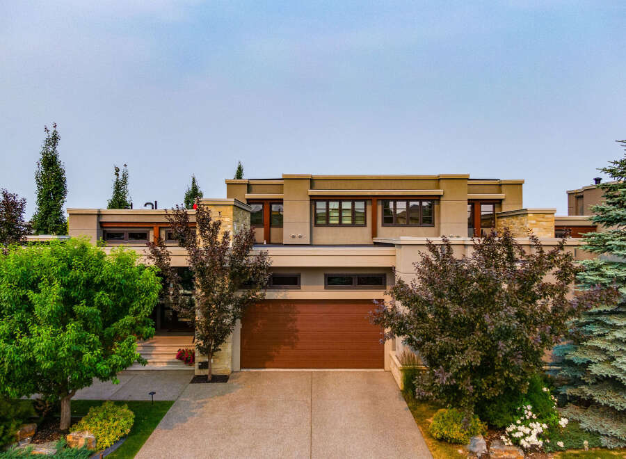 Discover modern luxury in this stunning home featuring a sleek contemporary design with clean lines and expansive windows.