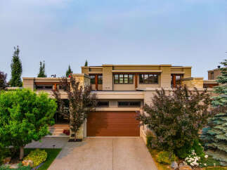 Discover modern luxury in this stunning home featuring a sleek contemporary design with clean lines and expansive windows.