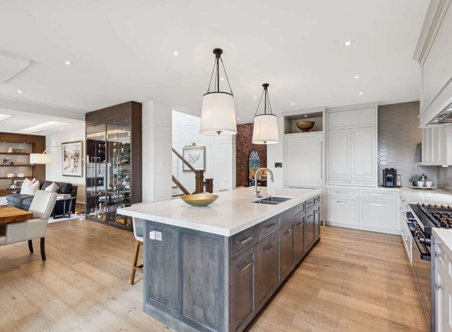 Experience luxury living in this stunning open-concept kitchen and living area.