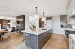 Experience luxury living in this stunning open-concept kitchen and living area.