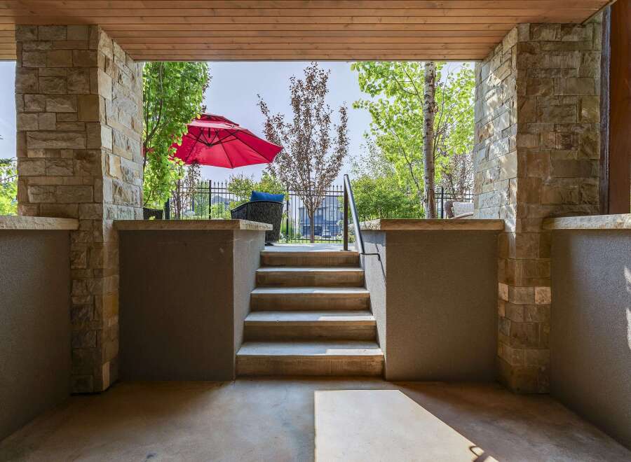 Step onto this inviting covered patio, perfect for enjoying the outdoors in any weather.