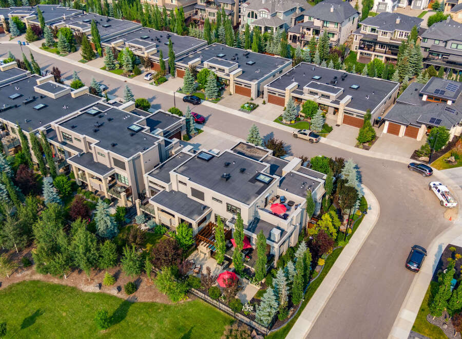 Experience luxury living in this stunning modern townhouse complex, featuring sleek architecture and premium finishes.