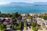 Experience coastal living at its finest with this stunning aerial view of a prime waterfront neighborhood.