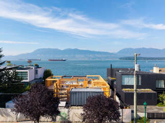 Experience modern living with this stunning waterfront property, currently under construction and offering breathtaking ocean views.