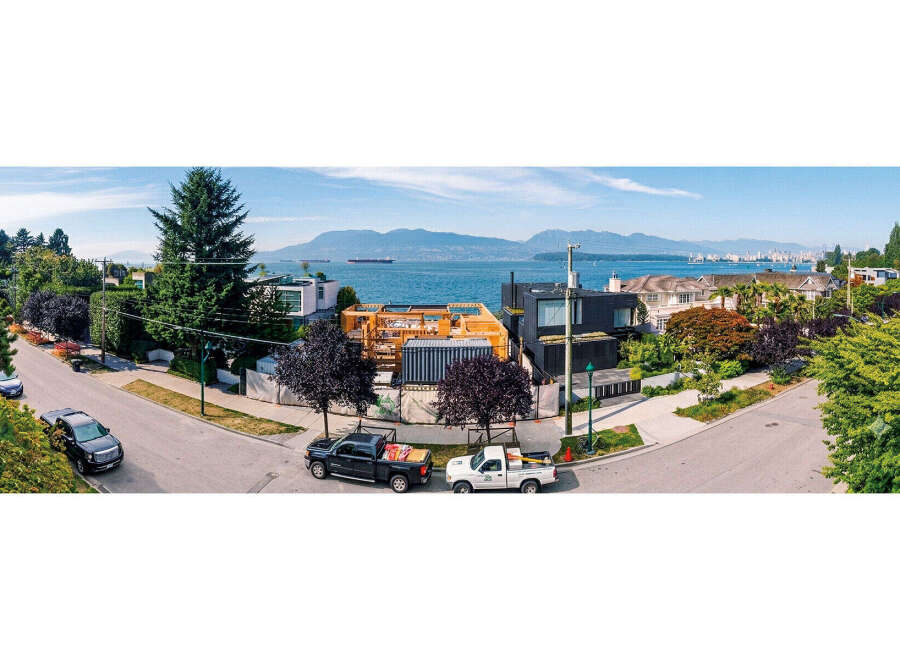 Experience breathtaking ocean and mountain views from this stunning modern home, currently under construction.