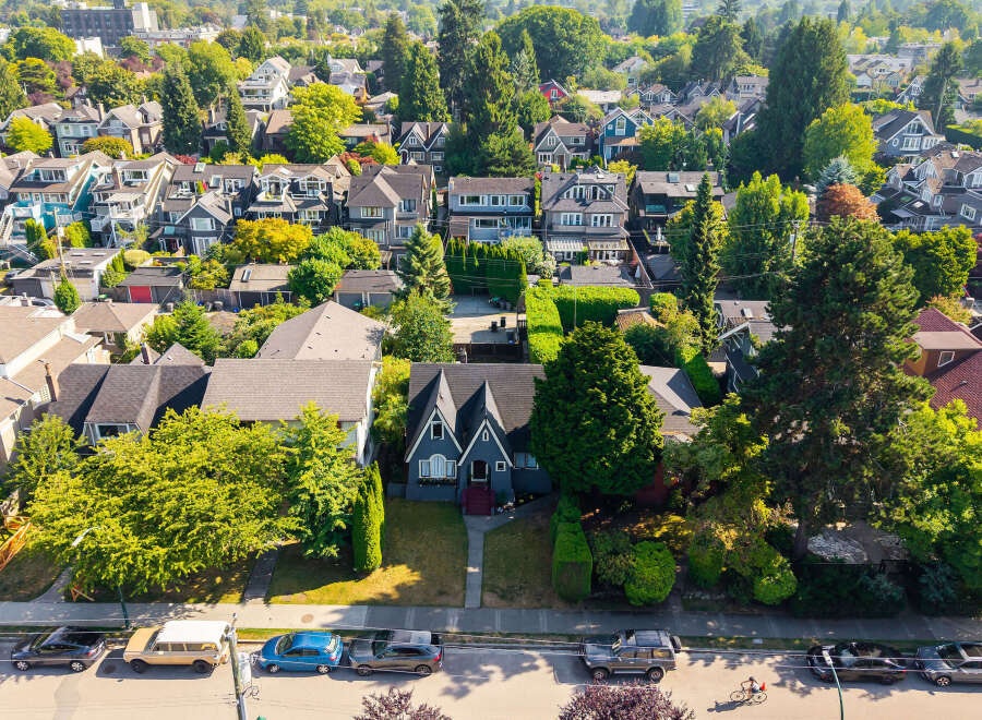 Discover this charming neighborhood with a variety of homes nestled amongst lush greenery.