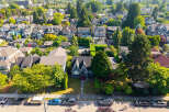 Discover this charming neighborhood with a variety of homes nestled amongst lush greenery.