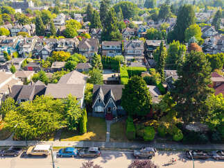 Discover this charming neighborhood with a variety of homes nestled amongst lush greenery.