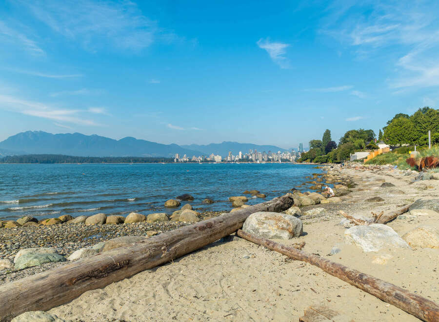 Experience coastal living at its finest with this stunning property offering breathtaking views of the ocean and distant mountains.