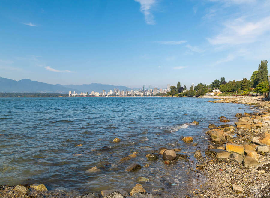 Experience breathtaking waterfront living with stunning views of the Vancouver skyline and majestic mountains.