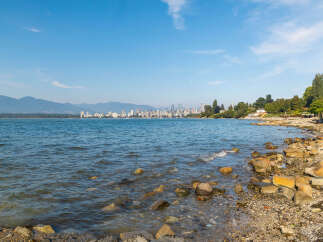 Experience breathtaking waterfront living with stunning views of the Vancouver skyline and majestic mountains.