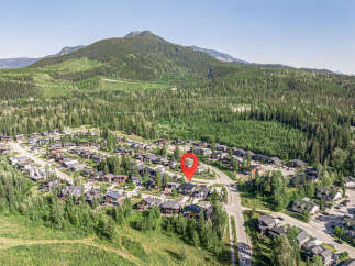 Discover this stunning mountain community offering modern homes nestled amidst lush forests and scenic vistas.