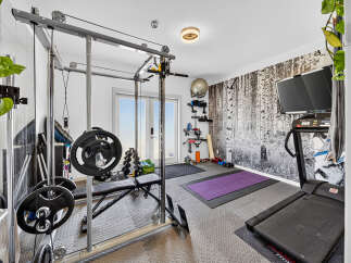 Transform your home into a personal fitness sanctuary with this fully equipped gym.