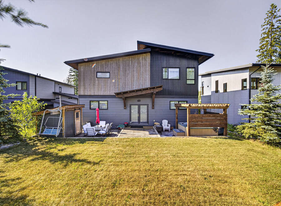 Experience modern living in this stunning home featuring a spacious backyard deck perfect for entertaining.