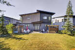 Experience modern living in this stunning home featuring a spacious backyard deck perfect for entertaining.