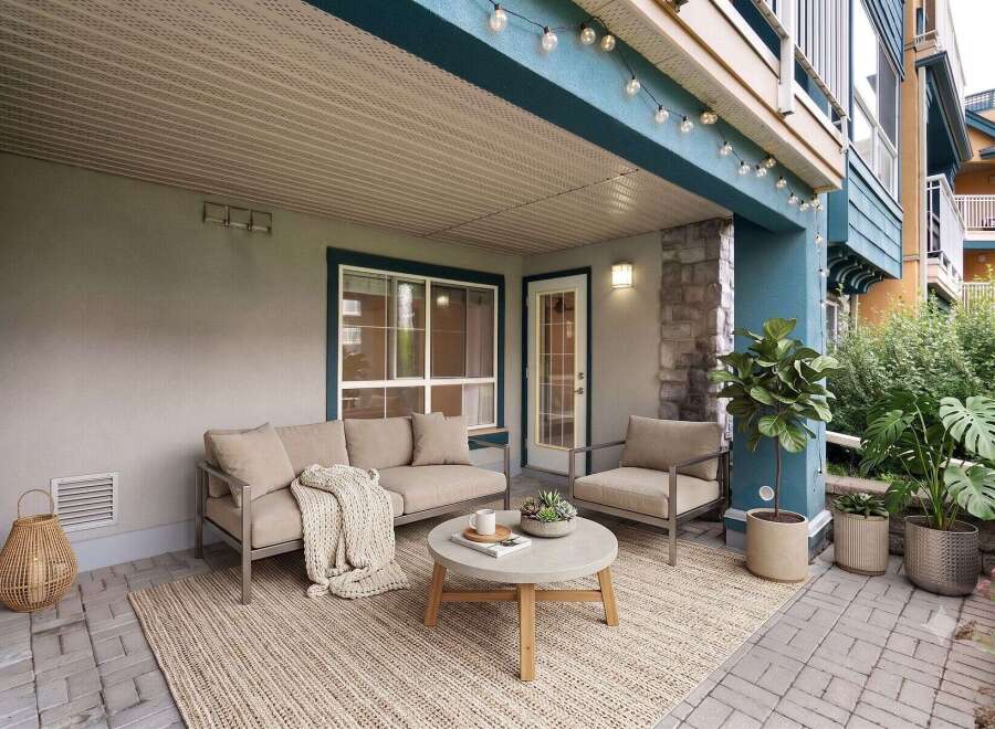 Enjoy outdoor living on this charming covered patio, perfect for relaxing or entertaining.