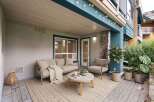 Enjoy outdoor living on this charming covered patio, perfect for relaxing or entertaining.
