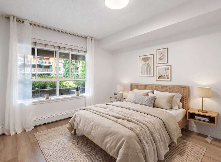 Experience serene living in this beautifully appointed bedroom, featuring a plush bed with a woven headboard and a cozy, textured throw.