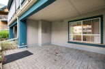 Discover this charming covered patio area, perfect for outdoor relaxation and entertaining.