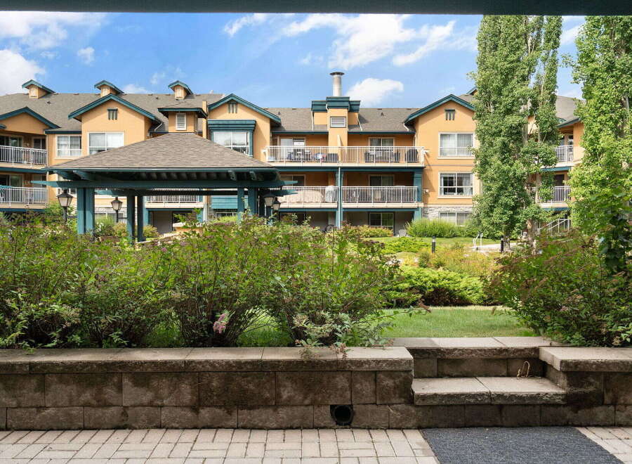 Discover comfortable living in this charming apartment complex, featuring a beautiful courtyard with a gazebo and lush landscaping.
