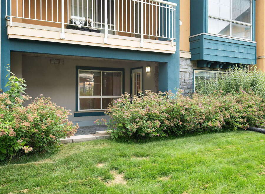 Enjoy outdoor living with this charming ground-floor unit featuring a private patio area, perfect for relaxing or entertaining.