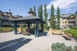 Enjoy outdoor living in this charming community space featuring a covered gazebo perfect for gatherings and relaxation.