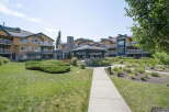 Discover comfortable living in this well-maintained apartment complex featuring a charming gazebo and lush green spaces.