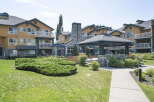 Discover comfortable living in this well-maintained apartment complex, featuring a charming gazebo and lush green spaces perfect for relaxation.