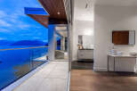 Experience luxury living with breathtaking ocean and mountain views from this stunning modern residence.