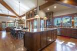 Experience luxurious mountain living in this stunning open-concept kitchen and dining area.