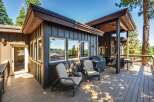 Enjoy outdoor living on this spacious deck, perfect for entertaining or relaxing amidst the scenic views.
