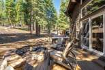 Enjoy the ultimate outdoor living experience with this stunning property featuring a luxurious hot tub and a charming stone fire pit.