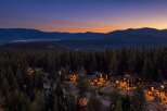 Nestled amidst a dense forest, this stunning property offers a serene mountain retreat.