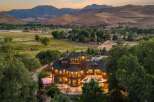 Experience luxury living in this stunning estate nestled amidst rolling hills and majestic mountains.