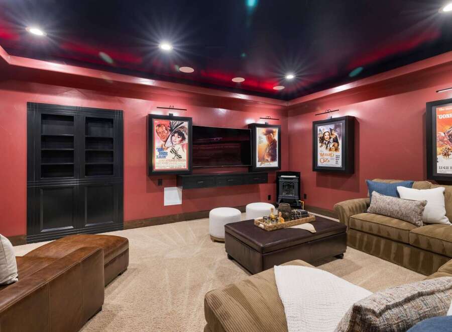 Step into this luxurious home theater, designed for the ultimate cinematic experience.