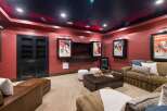 Step into this luxurious home theater, designed for the ultimate cinematic experience.