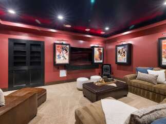 Step into this luxurious home theater, designed for the ultimate cinematic experience.
