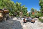 Enjoy outdoor living at its finest on this expansive flagstone patio, perfect for entertaining or relaxing.
