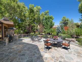 Enjoy outdoor living at its finest on this expansive flagstone patio, perfect for entertaining or relaxing.