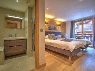 Experience comfort and style in this charming hotel room, featuring two cozy beds perfect for a restful night's sleep.