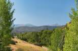 Experience the serene beauty of this mountain landscape, perfect for a secluded getaway or a peaceful residence.