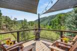 Enjoy breathtaking mountain views from this expansive deck, perfect for outdoor entertaining or quiet relaxation.