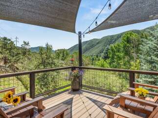 Enjoy breathtaking mountain views from this expansive deck, perfect for outdoor entertaining or quiet relaxation.