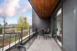 Enjoy outdoor living on this spacious balcony, perfect for al fresco dining or relaxing with a view.