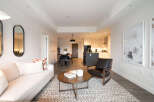 Experience modern living in this beautifully appointed apartment, featuring a spacious open-concept living and dining area perfect for entertaining.